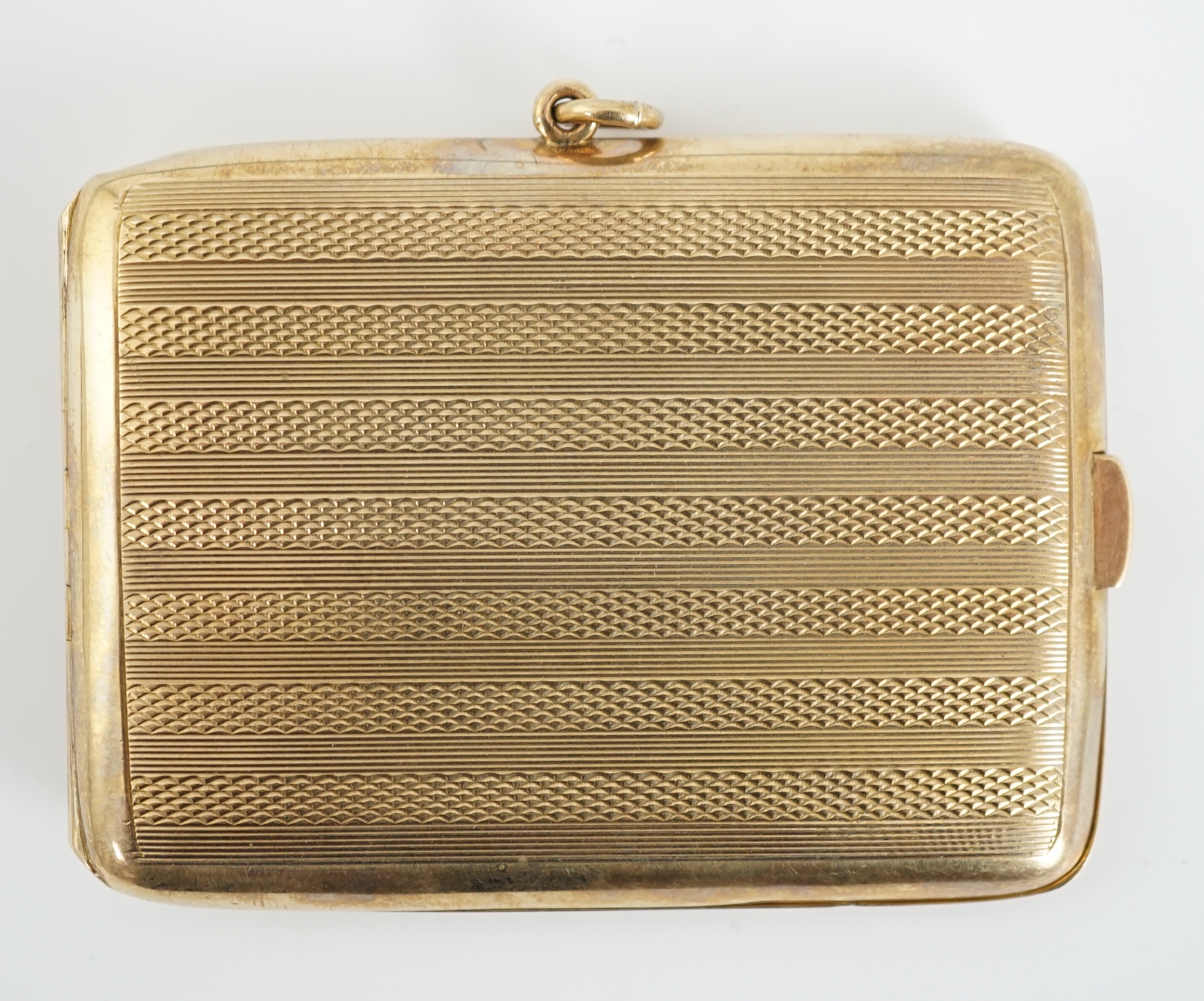 A George V engine turned 9ct gold rectangular match case